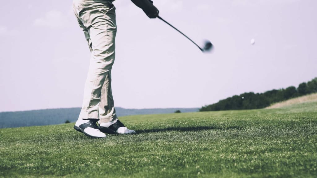 Playing golf